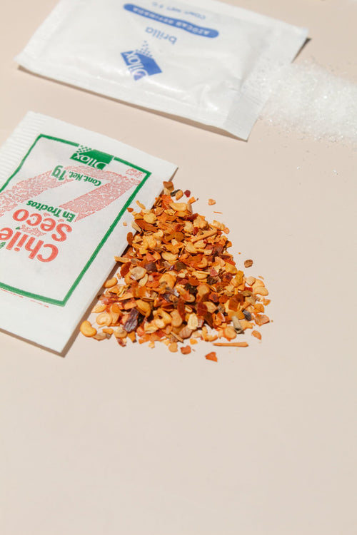 Sobre de chile quebrado Dilox con hojuelas de chile